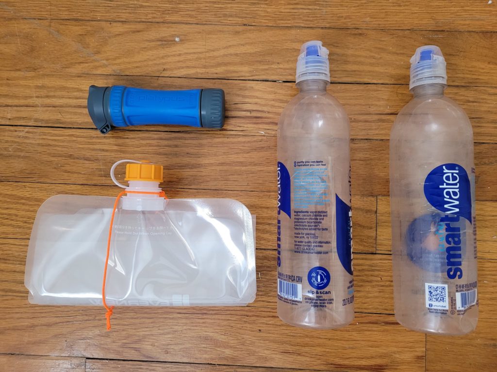 From left to right, top to bottom: Platypus Quickdraw filter, 700ml Smartwater bottles, 2L Evernew water bag